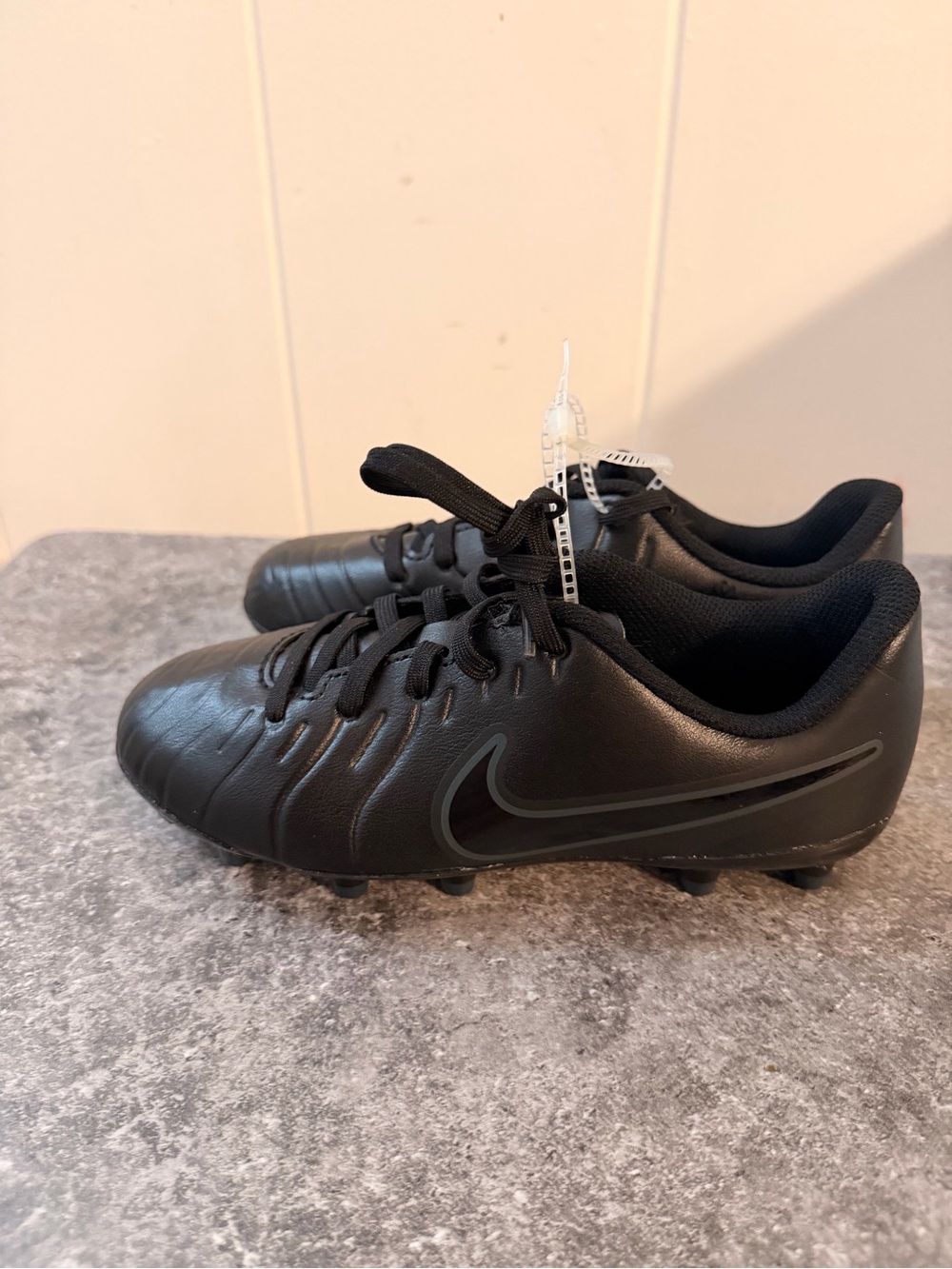 Nike Kids Black Soccer Cleats with Subtle Dark Swoosh